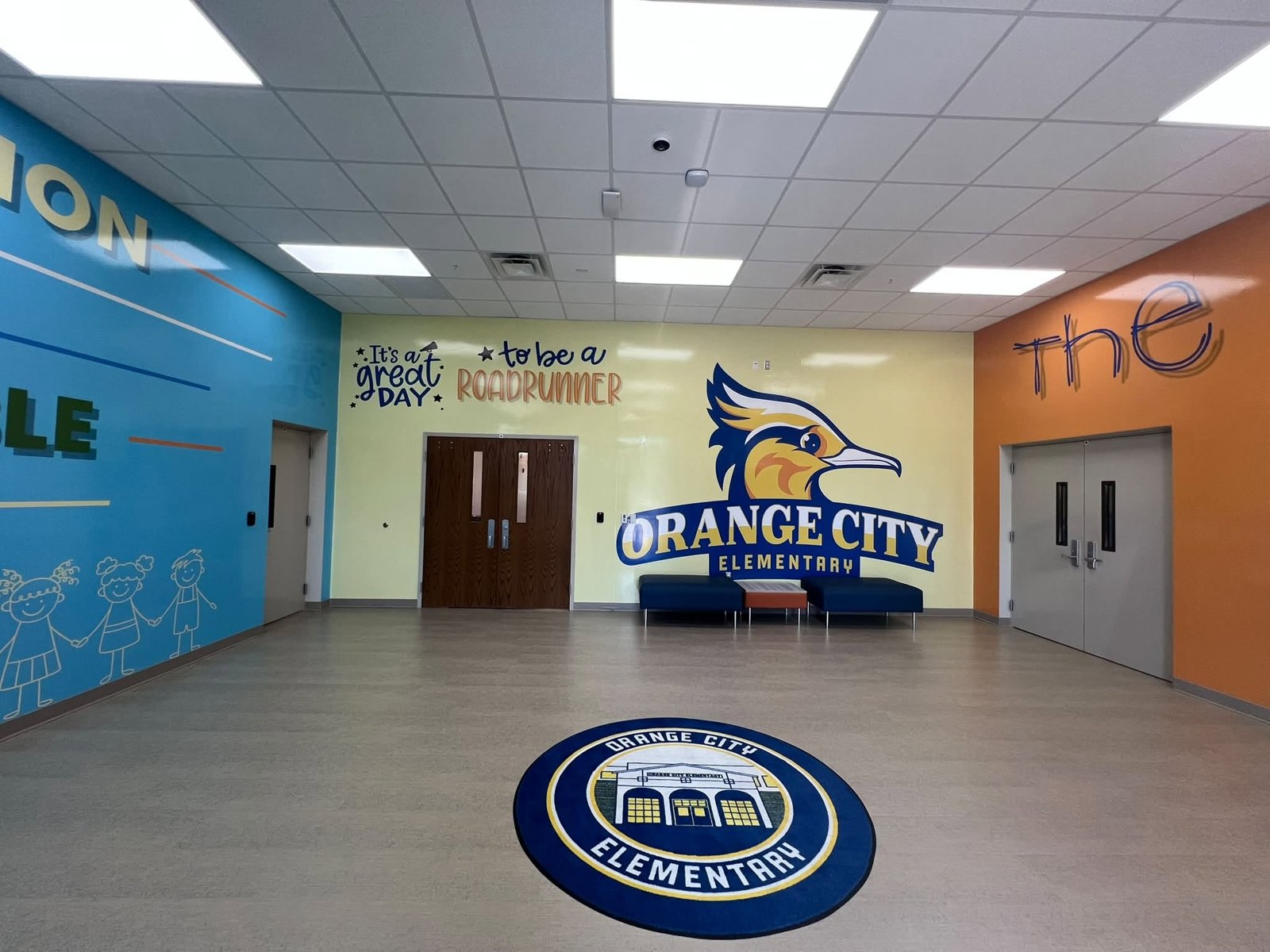 Full-color vinyl wall graphics and logo in the lobby of Orange City Elementary School